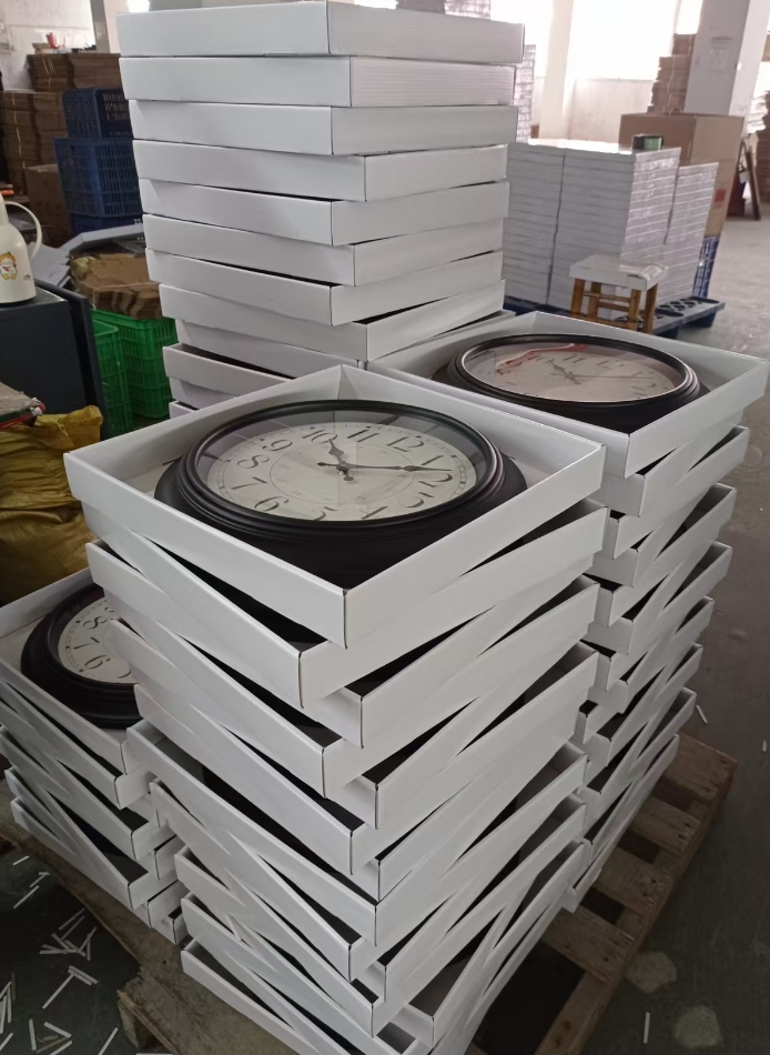 The wall clocks being packaged